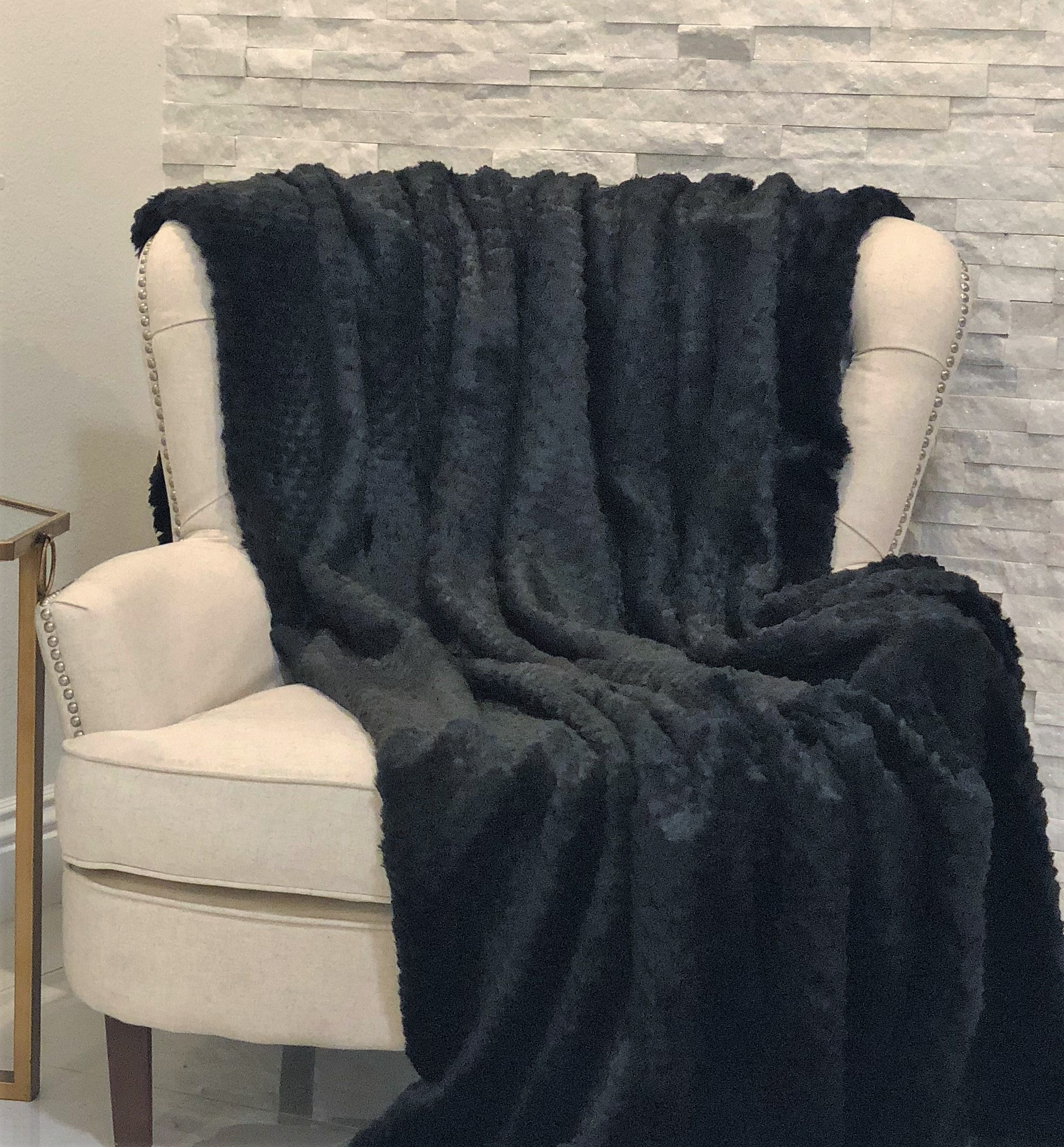 Luxurious Black Mink Faux Fur Throw Blanket with soft texture and elegant design, perfect for cozying up in style.