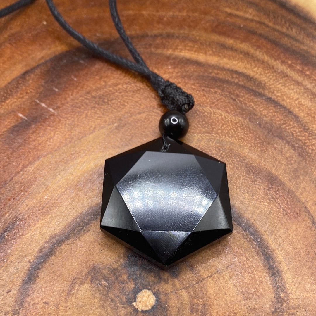 A beautiful Black Obsidian Faceted Hexagon Necklace, featuring a 32-inch adjustable chain and a unique hexagon-shaped pendant.