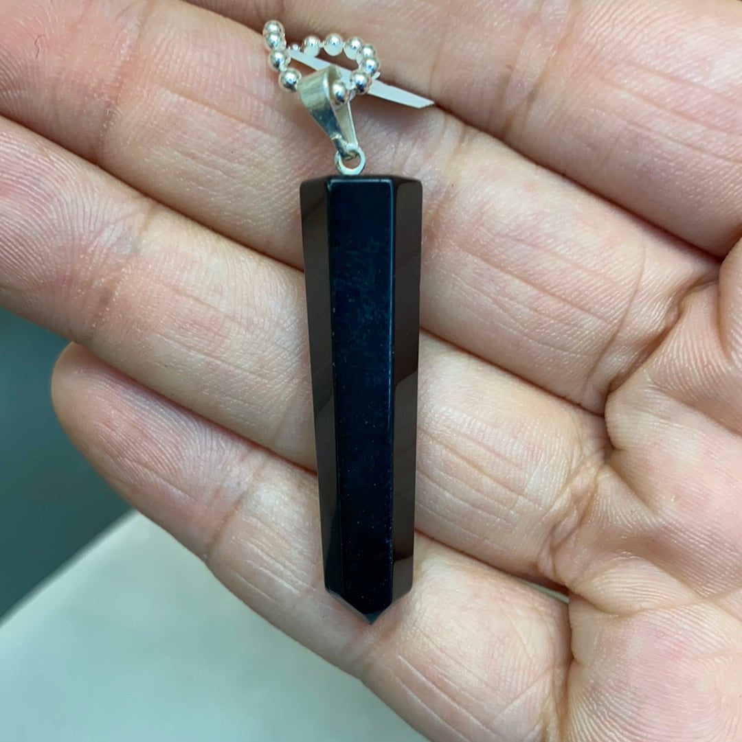 Black Obsidian Point Pendant with hematite beads on a black cord, symbolizing protection and grounding.