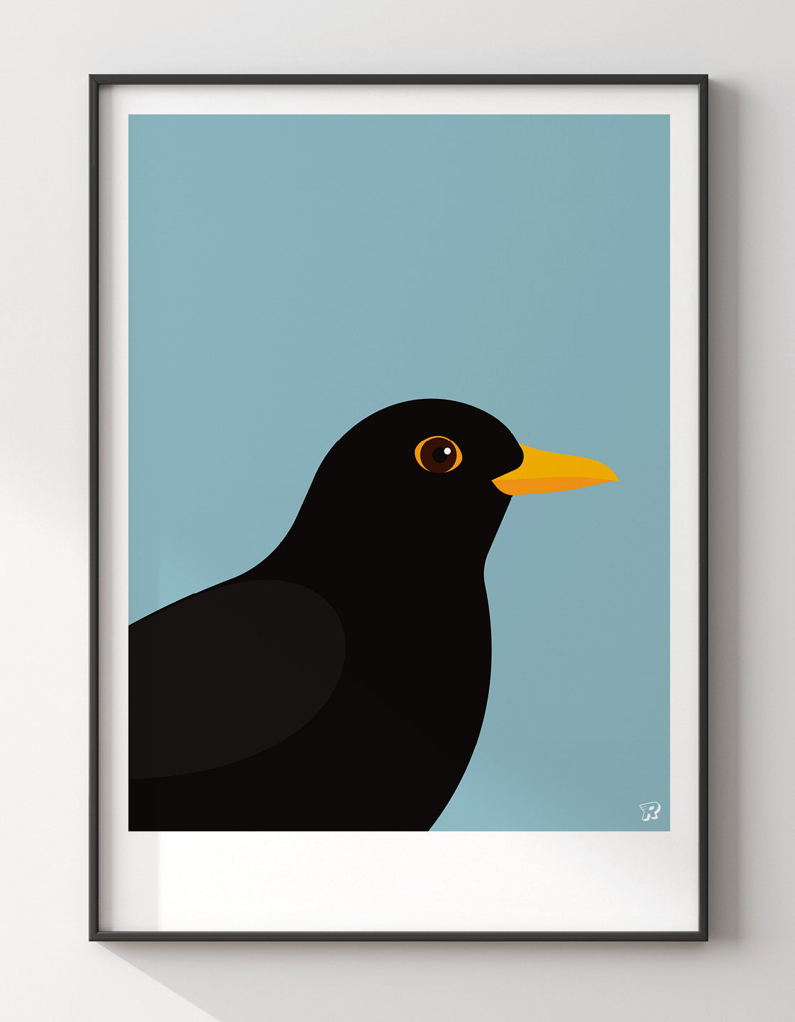 A minimalist blackbird print featuring a bold blackbird against a colorful background, perfect for modern decor.