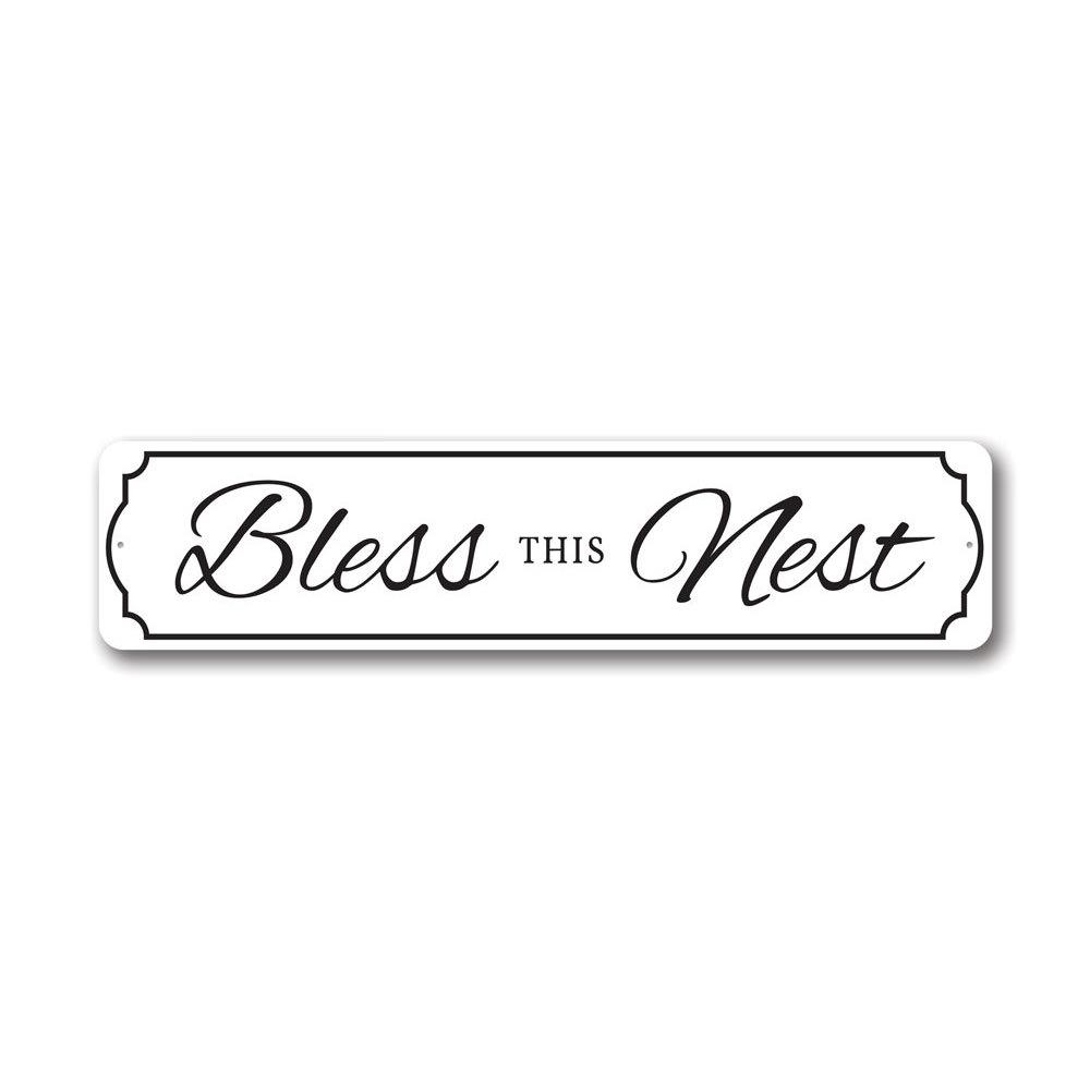 A beautifully crafted Bless This Nest Sign made of quality aluminum, featuring a charming design suitable for home decor.