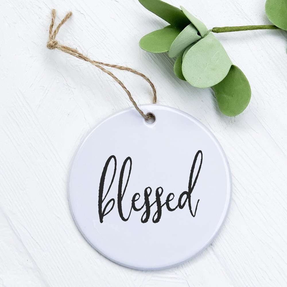 A beautifully designed Blessed porcelain ornament featuring original artwork, perfect for gifting or home decor.