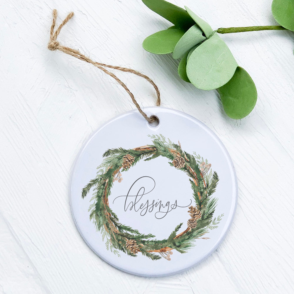 A beautifully crafted porcelain ornament featuring a Blessings Wreath design, showcasing vibrant colors and a smooth gloss finish.