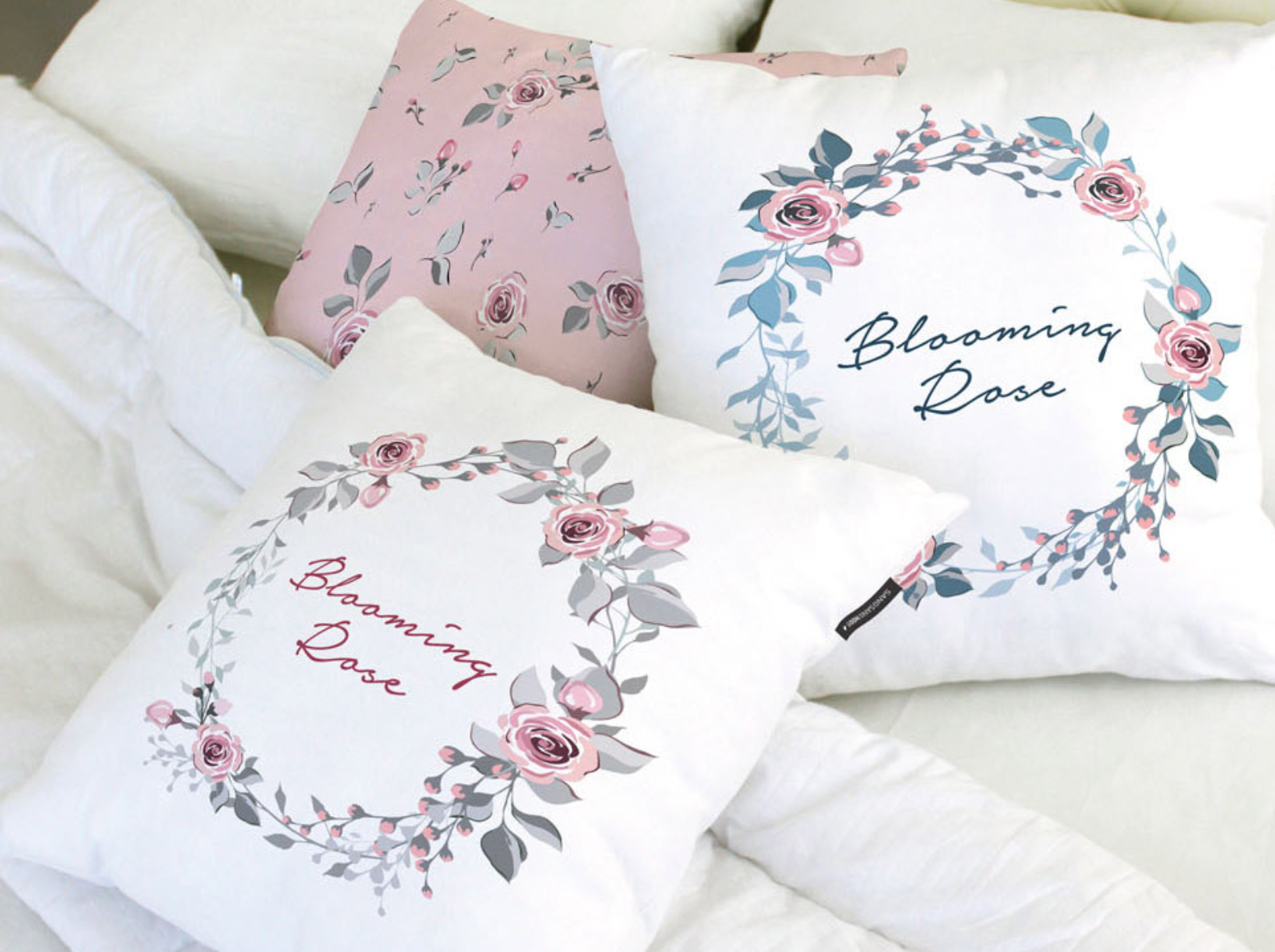 Blooming Rose floral perfume cushions showcasing vibrant floral designs and soft microfiber material.