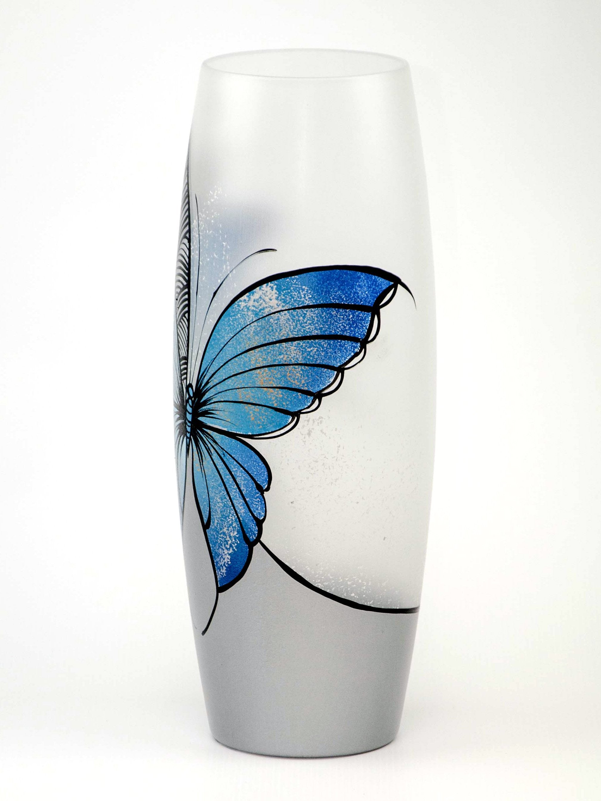 Large handpainted glass vase featuring a blue butterfly design, perfect for displaying flowers.