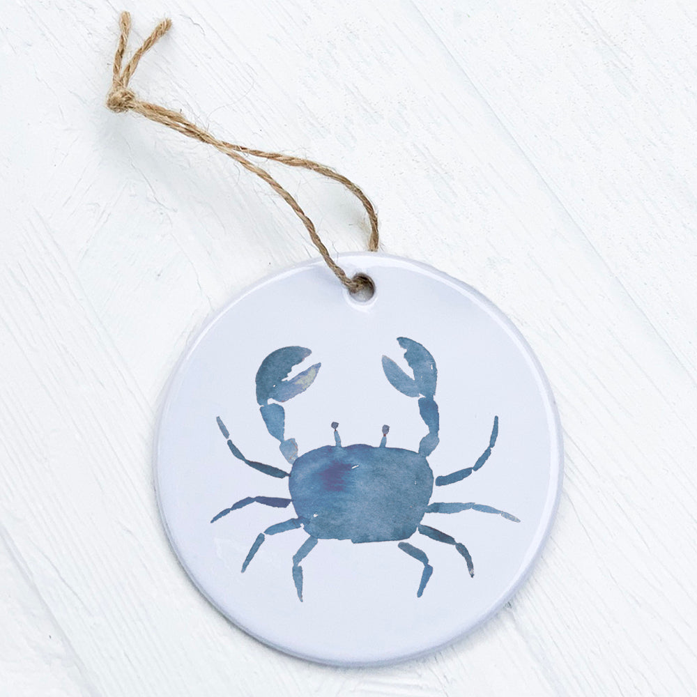 A beautifully crafted Blue Crab Ornament made of high-quality porcelain, featuring a vibrant design and smooth glossy finish.