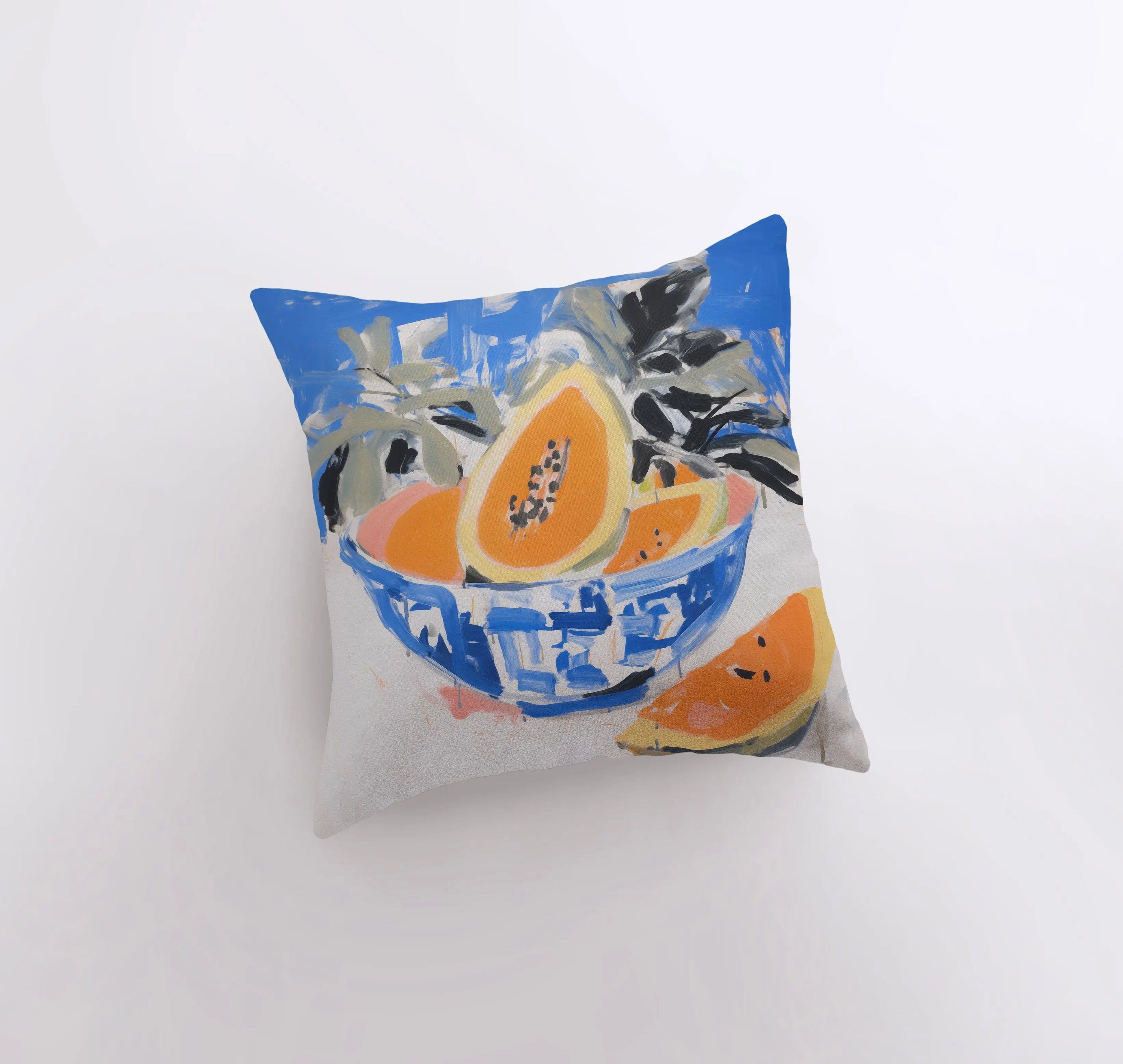 A vibrant blue papaya bowl pillow featuring a gouache painting, showcasing a colorful fruit design on a cotton/polyester blend fabric.