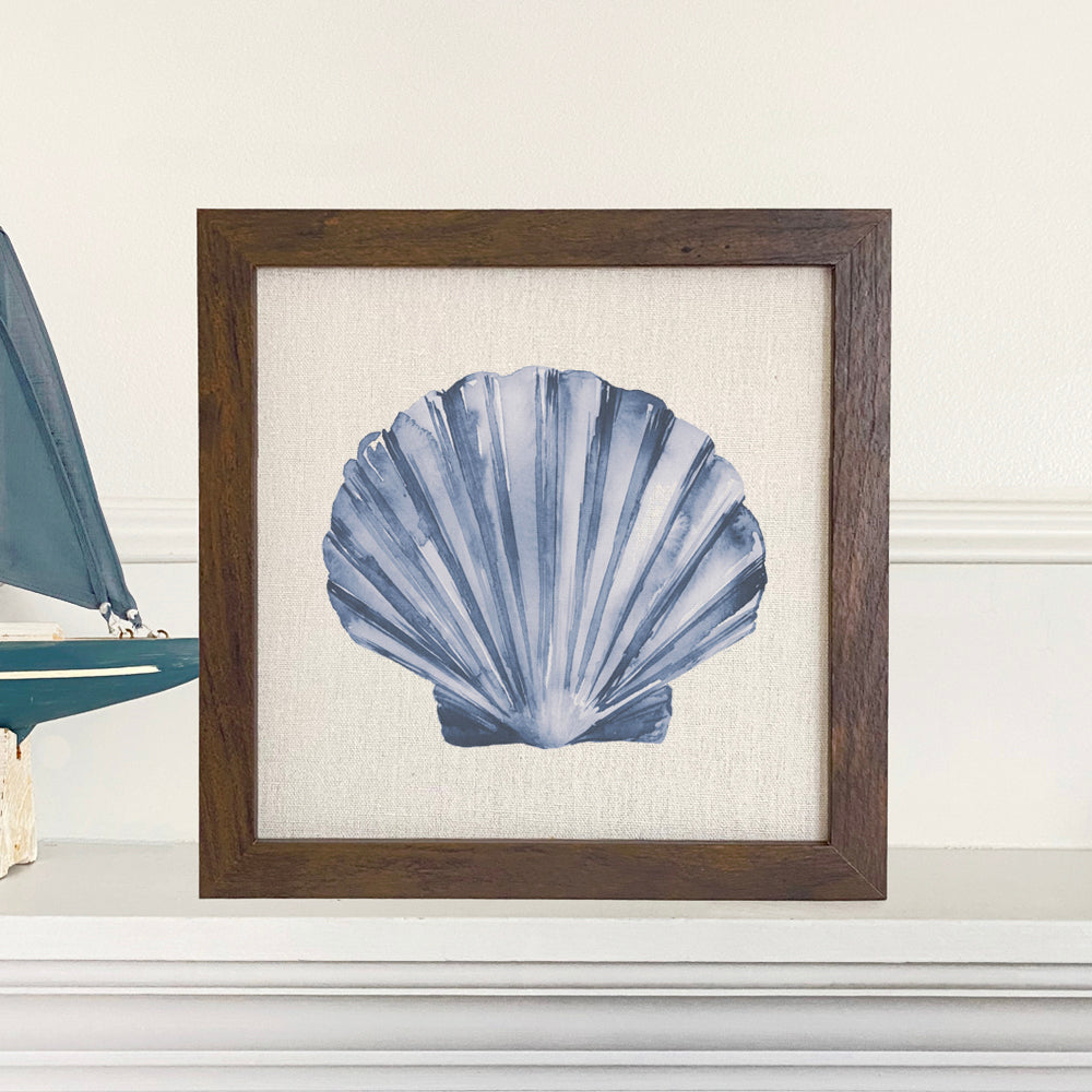 Blue Shell Framed Sign with a stylish wood frame and linen-look background, perfect for home decor.