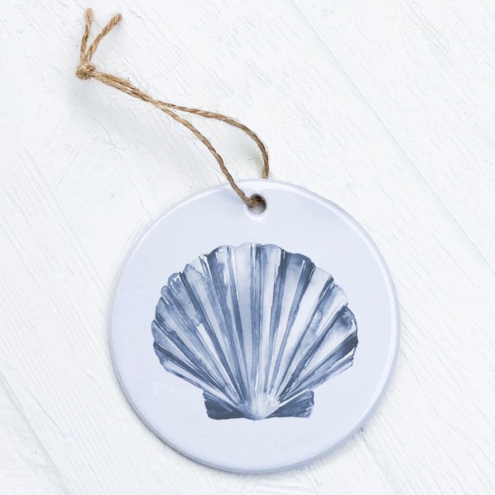 A beautifully crafted Blue Shell Ornament made of high-quality porcelain, featuring a vibrant design and smooth glossy finish, perfect for gifting or home decor.