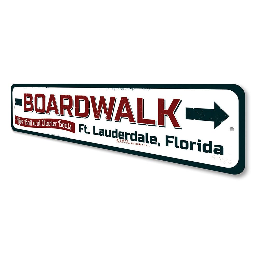 A vibrant Boardwalk Arrow Sign made of aluminum, featuring a coastal design perfect for beach houses and outdoor decor.