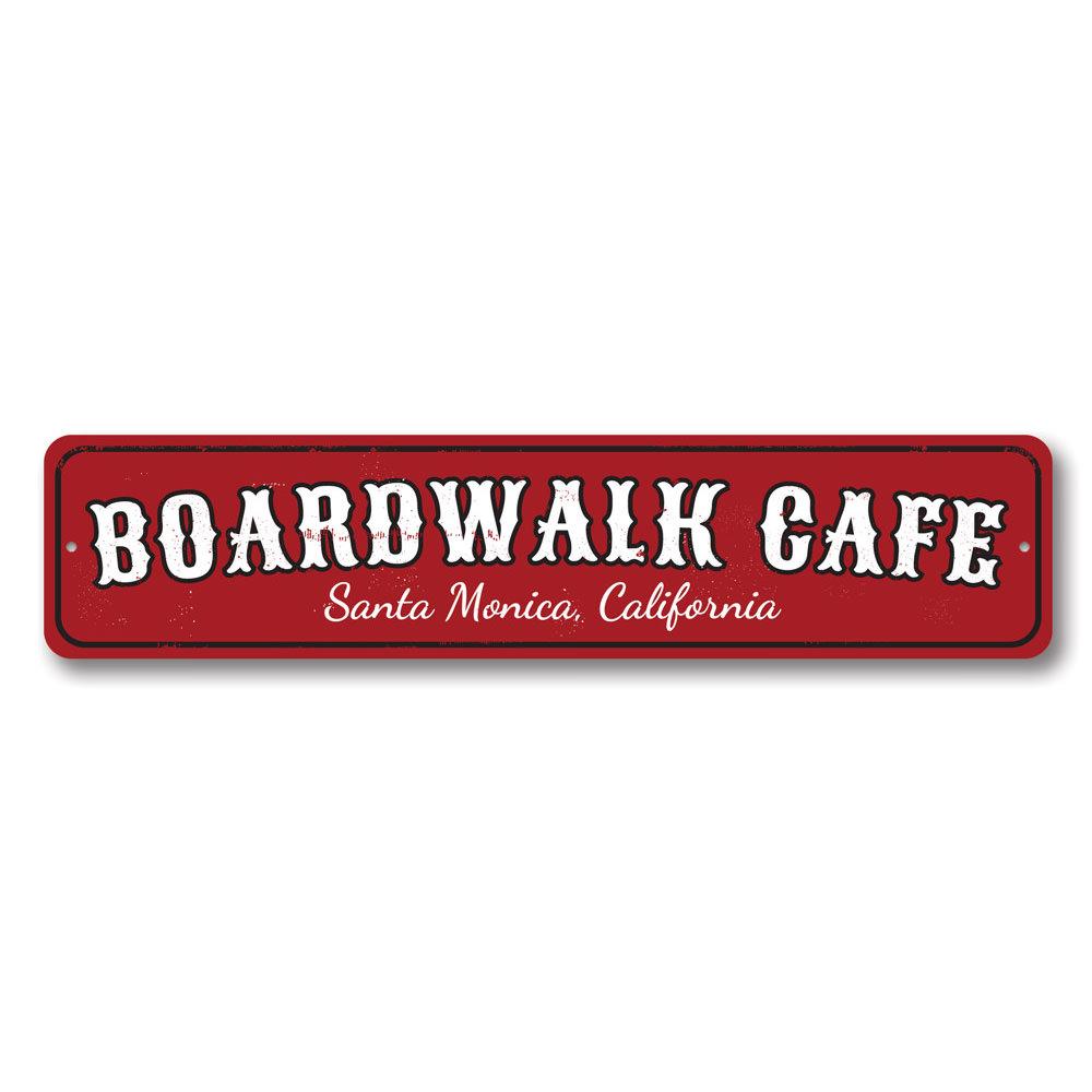 A decorative Boardwalk Cafe Sign made of high-quality aluminum, featuring customizable text for beach-themed decor.