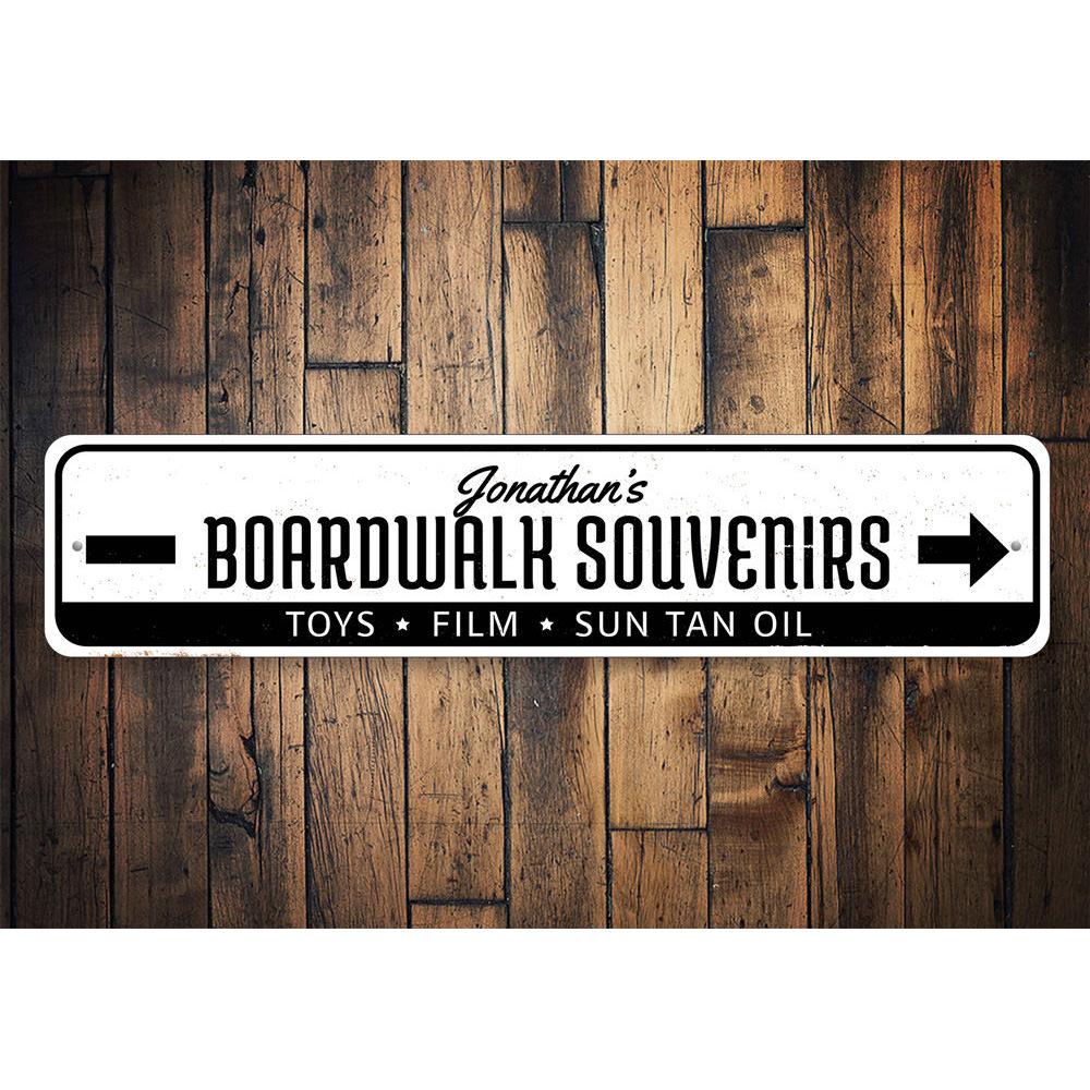 A decorative Boardwalk Souvenirs Sign made of high-quality aluminum, featuring customizable text and pre-drilled holes for easy mounting.