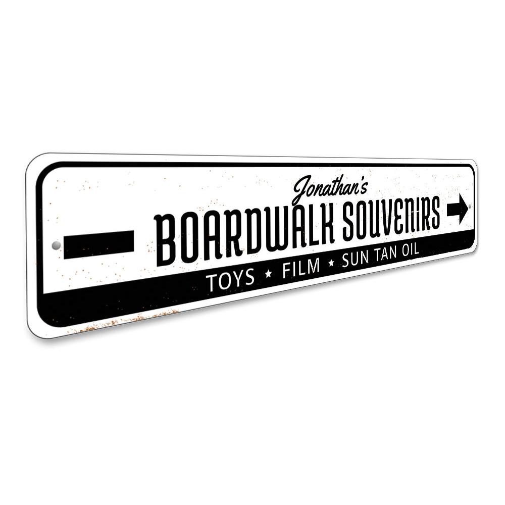 A decorative Boardwalk Souvenirs Sign made of high-quality aluminum, featuring customizable text and pre-drilled holes for easy mounting.