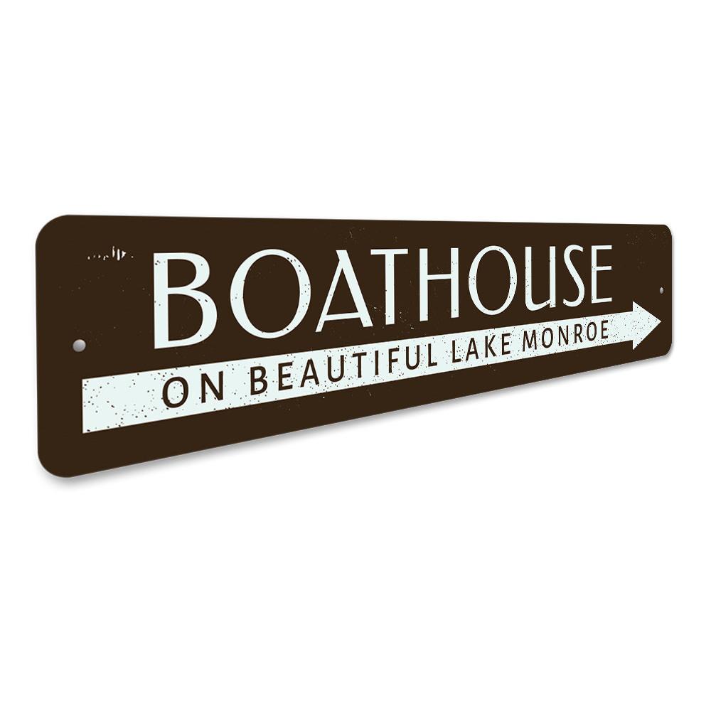 A beautifully crafted Boat House Lake Sign made from high-quality aluminum, featuring customizable text and a rustic design, perfect for lakehouse decor.