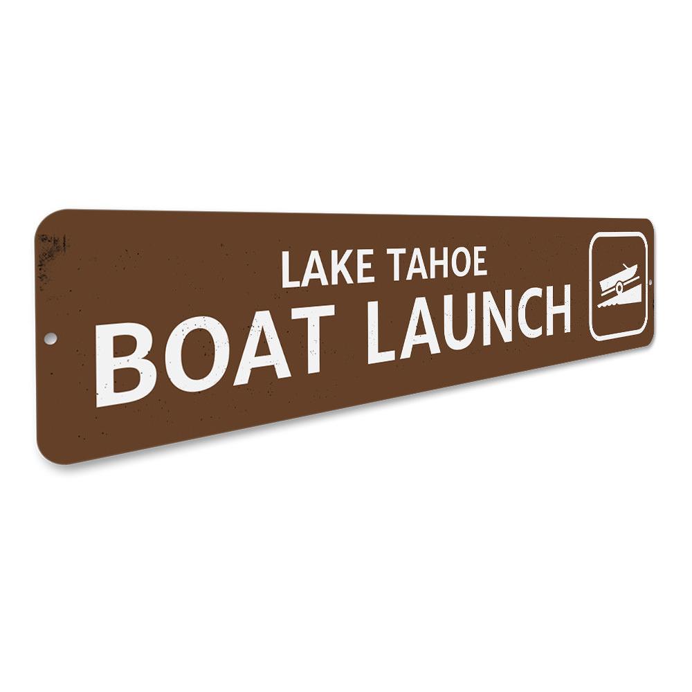 A decorative Boat Launch Lake Sign made of high-quality aluminum, featuring customizable text, ideal for lakehouses and outdoor decor.