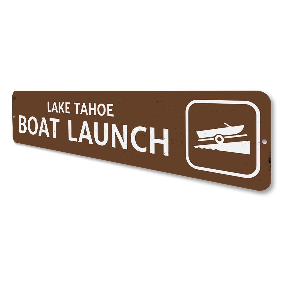 A decorative Boat Launch Lake Sign made of high-quality aluminum, featuring customizable text, ideal for lakehouses and outdoor decor.