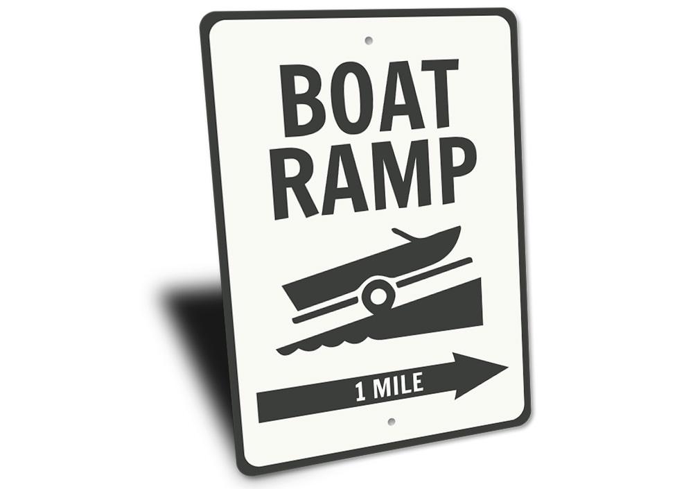 Boat Ramp Directional Sign made of durable aluminum, featuring customizable text and pre-drilled holes for easy mounting, perfect for lakehouse decor.