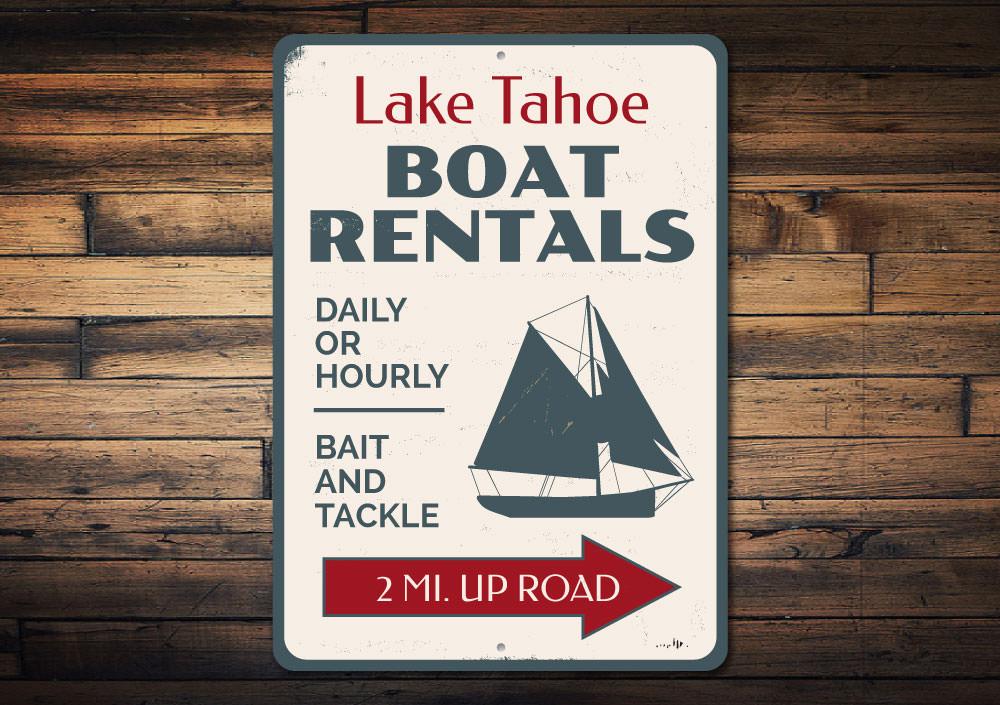 A decorative Boat Rentals Sailboat Sign made of high-quality aluminum, featuring customizable text and a vibrant design, perfect for lakehouse decor.