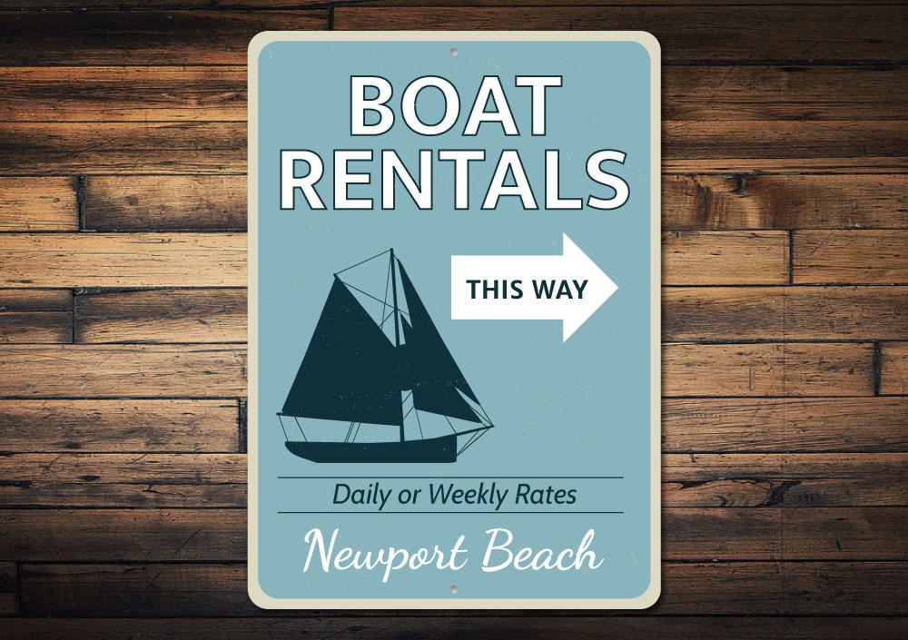 Boat Rentals This Way Sign made of aluminum, featuring customizable text and pre-drilled holes for easy mounting, perfect for coastal decor.