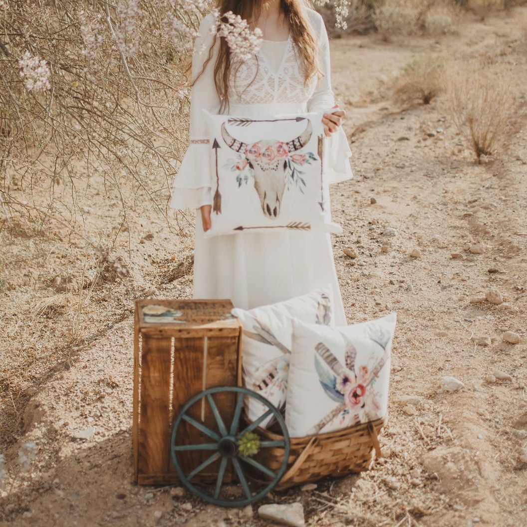 Boho Bull Skull and Arrows pillow cover featuring floral designs and concealed zipper, handmade in America.