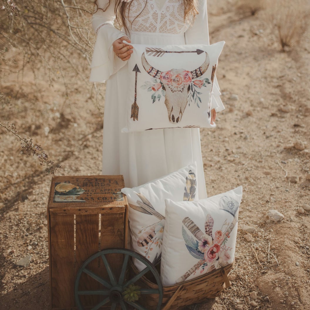 Boho Bull Skull and Arrows pillow cover featuring floral designs and concealed zipper, handmade in America.