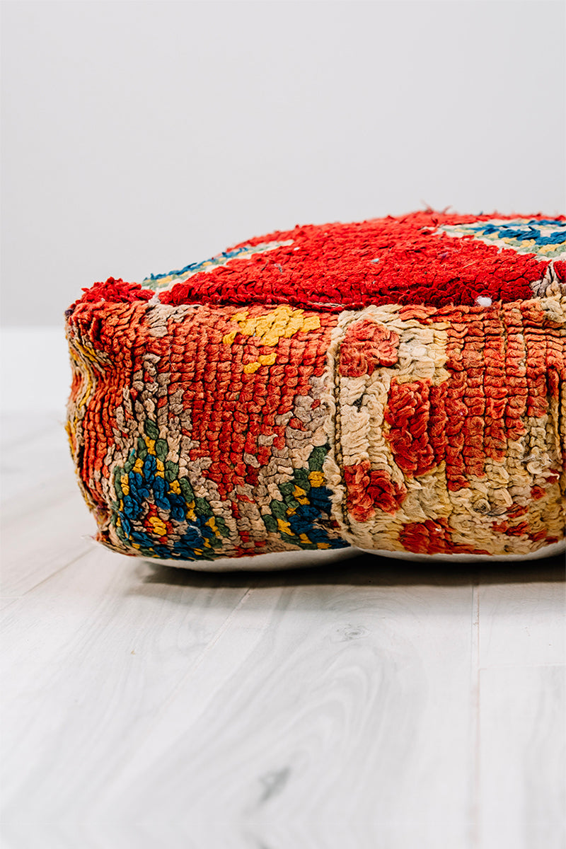 Bonbon Bebe Berber Pillow, a colorful 28x28 wool cushion featuring vibrant patterns from the Boujad Berber tribe.