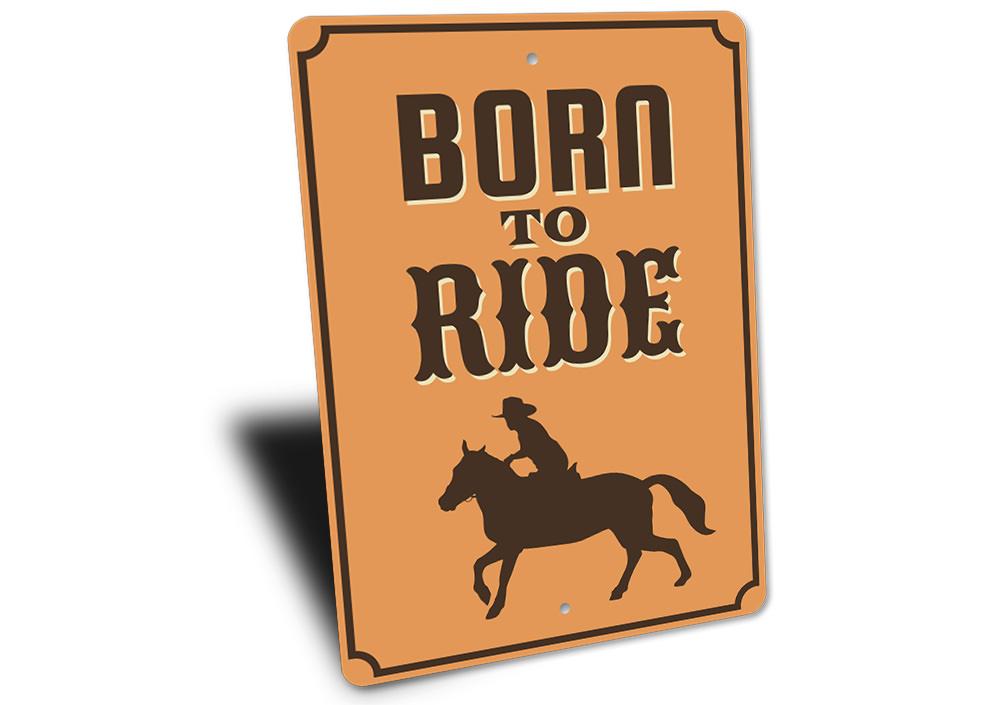 A decorative 'Born to Ride' sign made of high-quality aluminum, featuring a bold design suitable for man caves or garages.