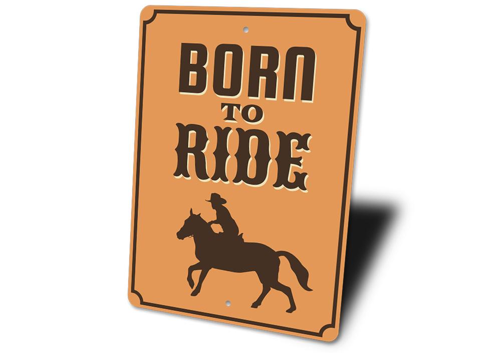 A decorative 'Born to Ride' sign made of high-quality aluminum, featuring a bold design suitable for man caves or garages.