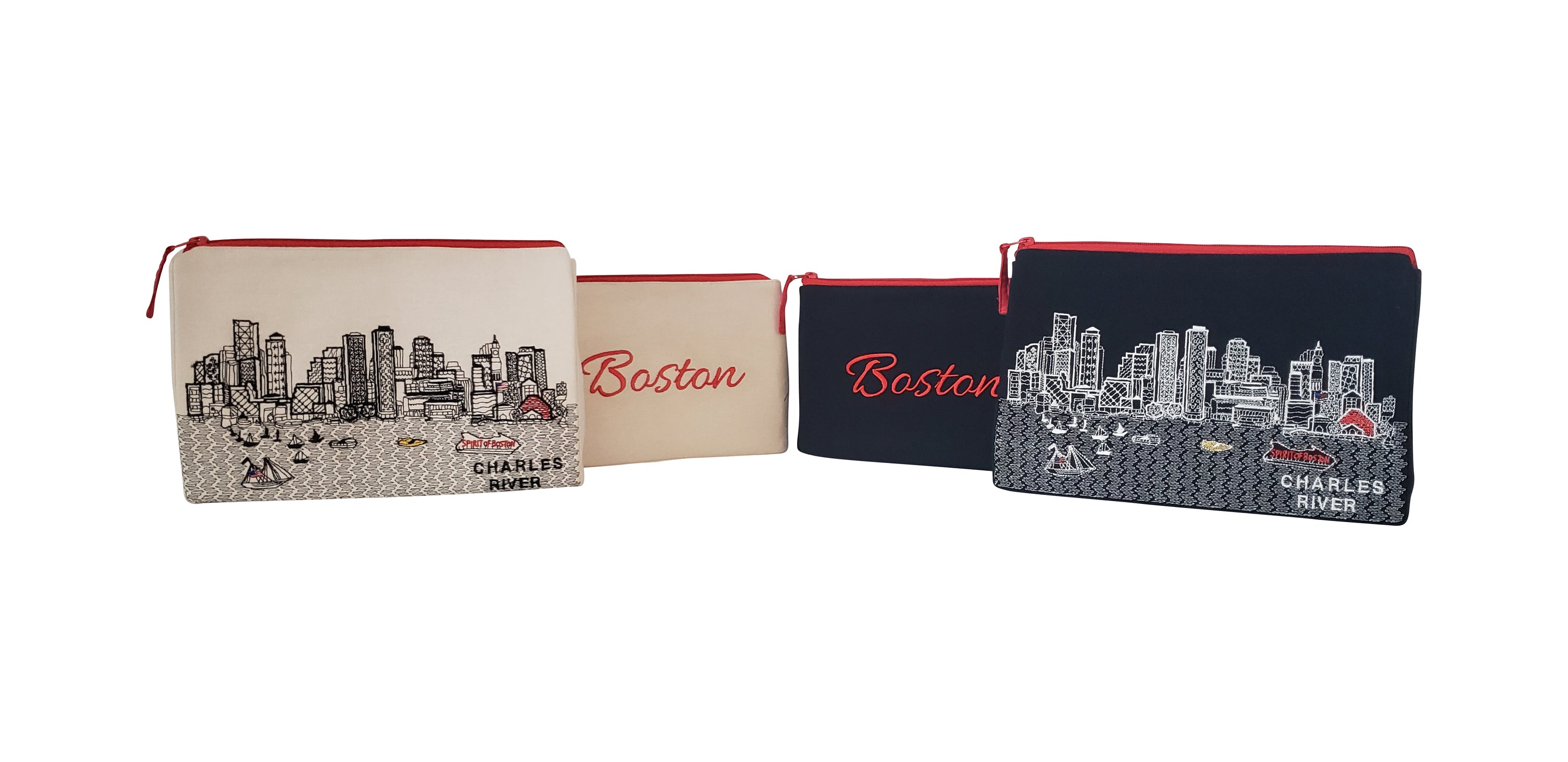 Boston Makeup Bag set featuring embroidered skyline design on cream and black cotton canvas with red waterproof lining.