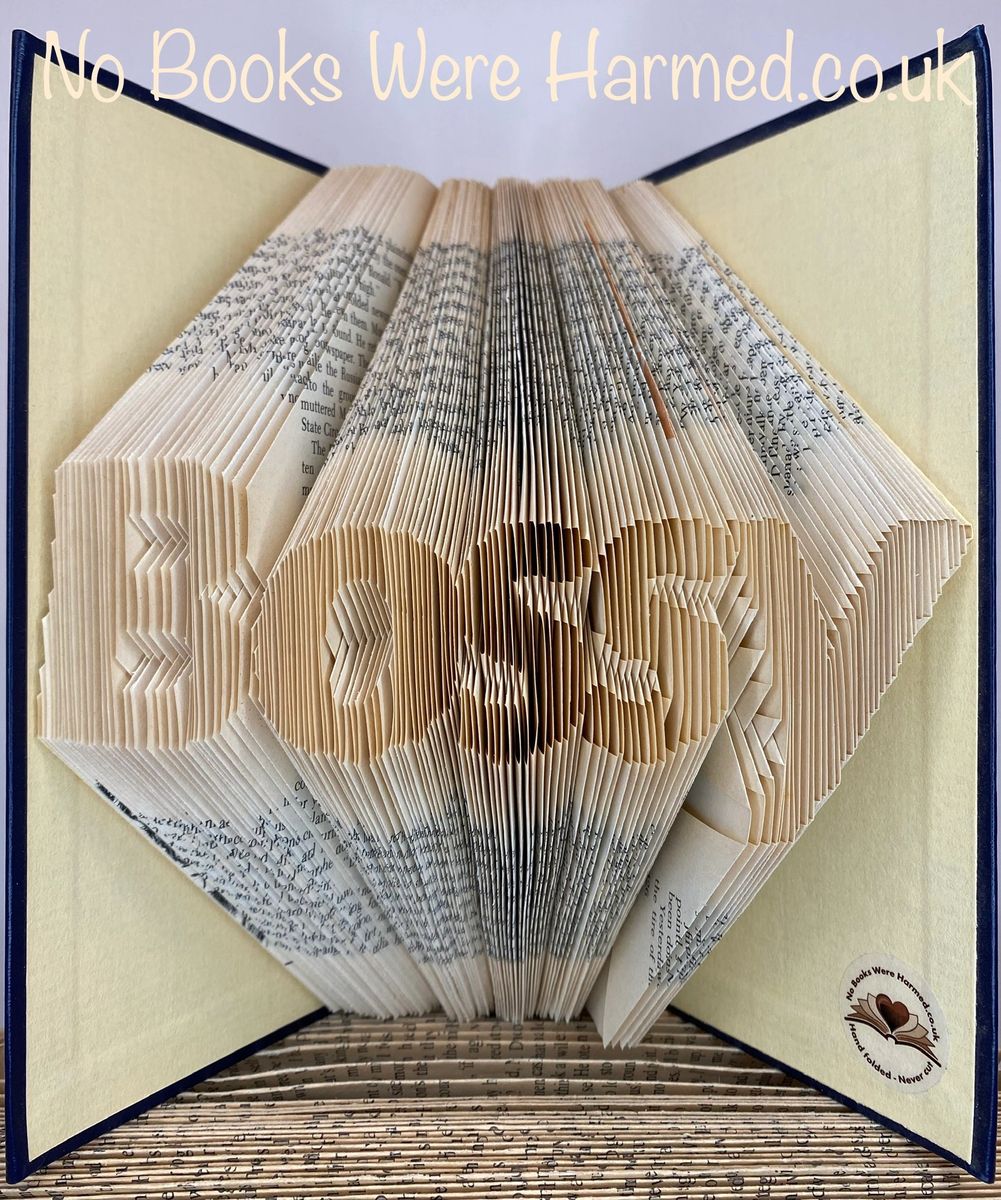 Handcrafted 'Bossy' #3 style art piece made from vintage book pages, showcasing intricate folds and unique design.