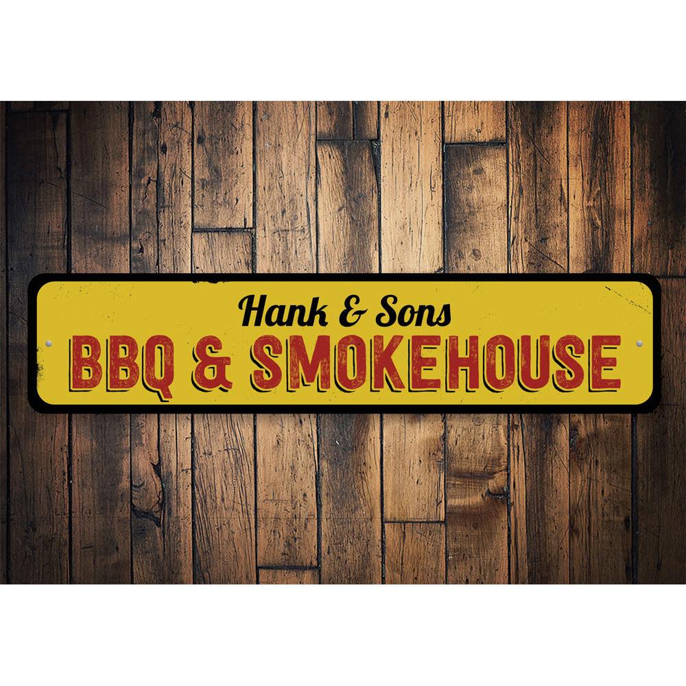 A decorative BBQ & Smokehouse Sign made of high-quality aluminum, featuring customizable text and pre-drilled holes for easy mounting.