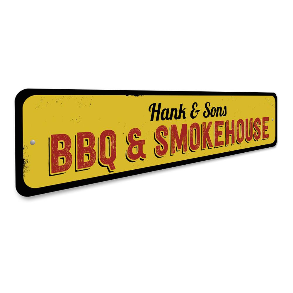 A decorative BBQ & Smokehouse Sign made of high-quality aluminum, featuring customizable text and pre-drilled holes for easy mounting.