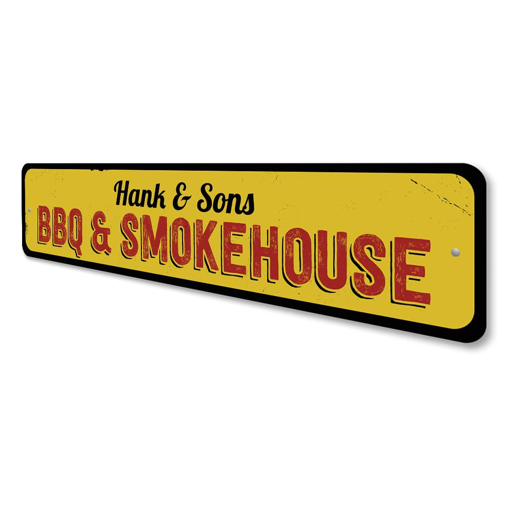 A decorative BBQ & Smokehouse Sign made of high-quality aluminum, featuring customizable text and pre-drilled holes for easy mounting.