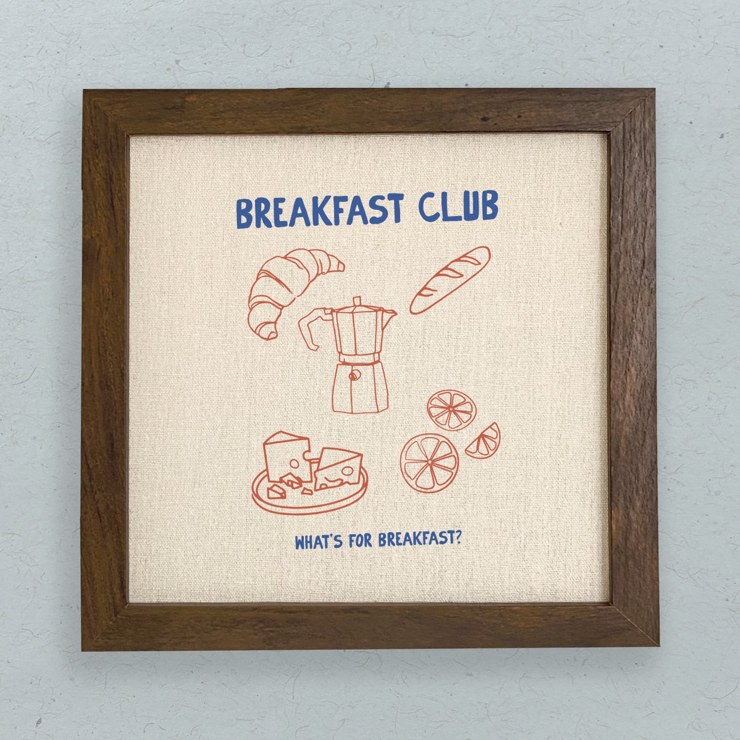 Breakfast Club Framed Sign with a stylish wood frame, eco-friendly printing, and a neutral linen-look background.