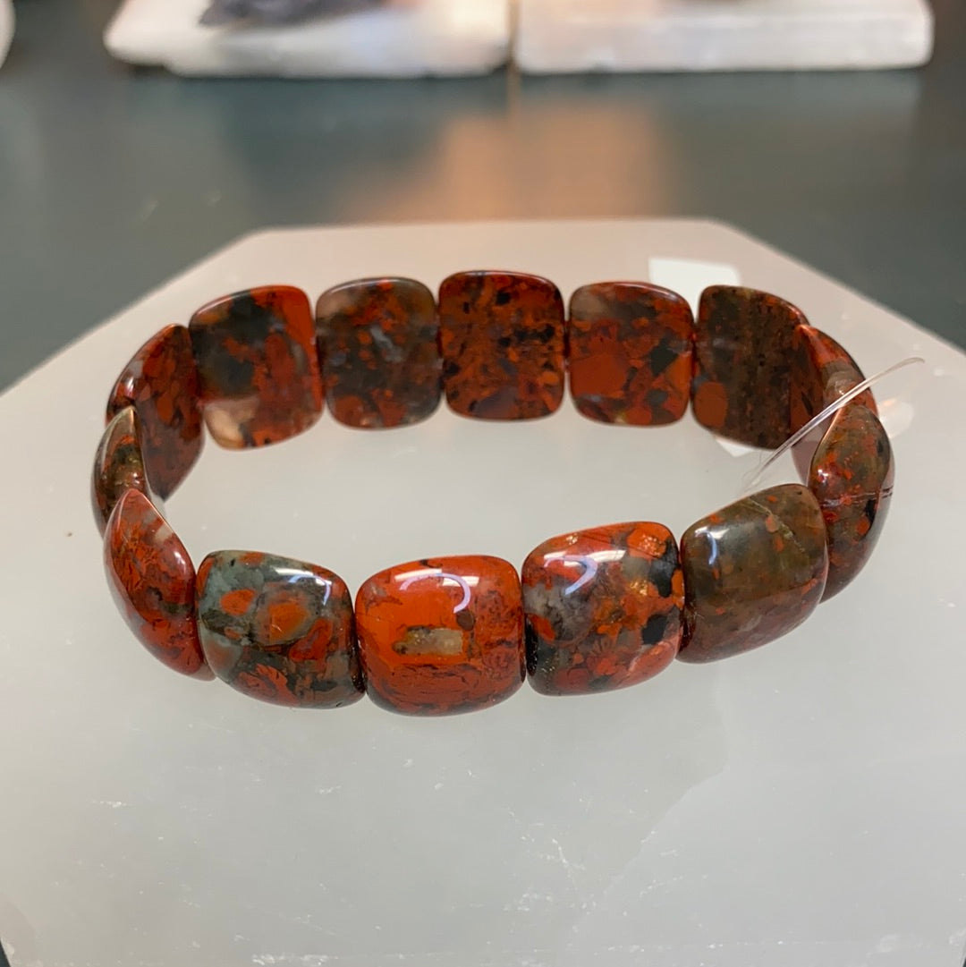 Brecciated Jasper Oval Beaded Bracelet showcasing unique colors and patterns, perfect for both men and women.