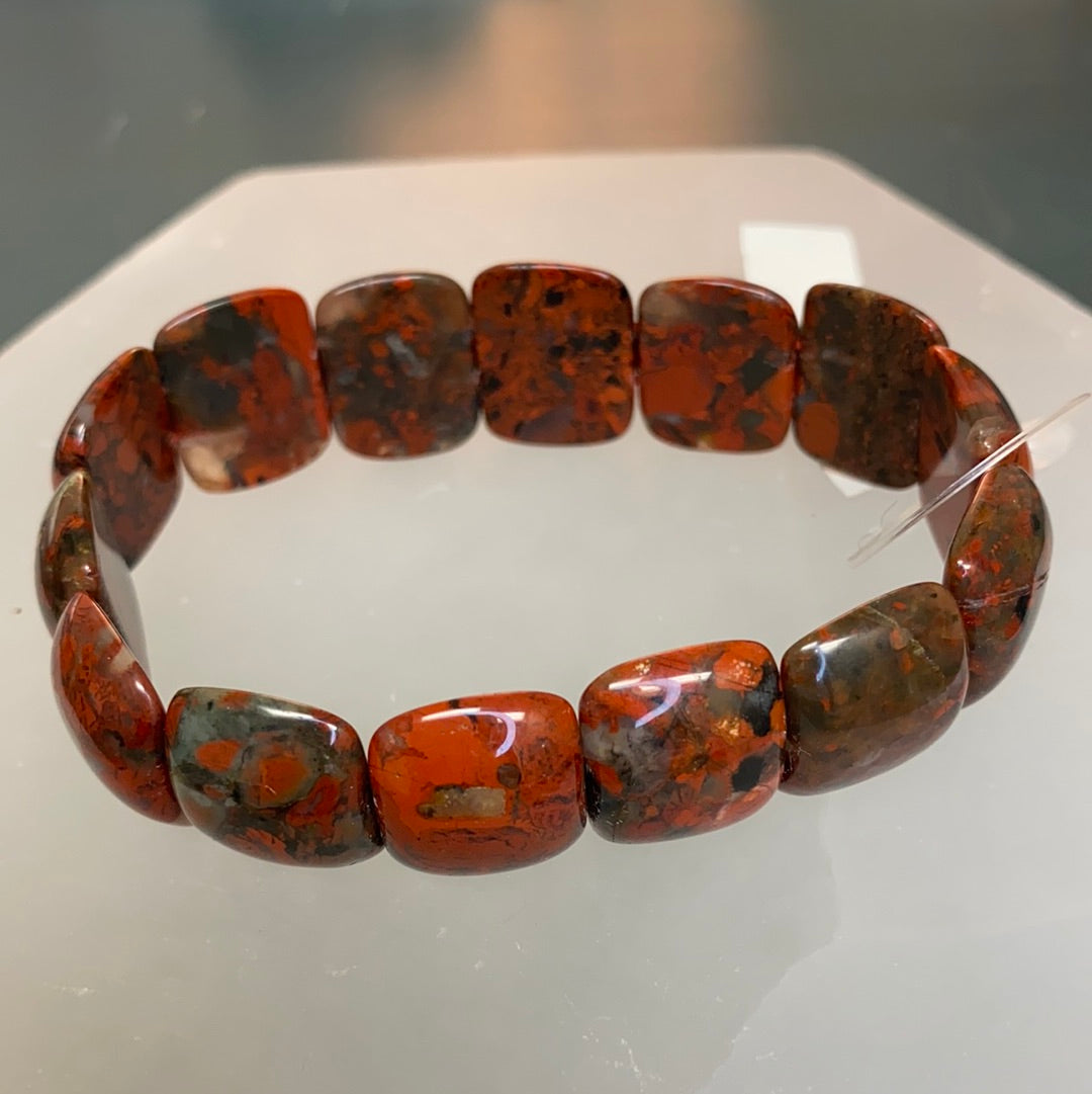 Brecciated Jasper Oval Beaded Bracelet showcasing unique colors and patterns, perfect for both men and women.