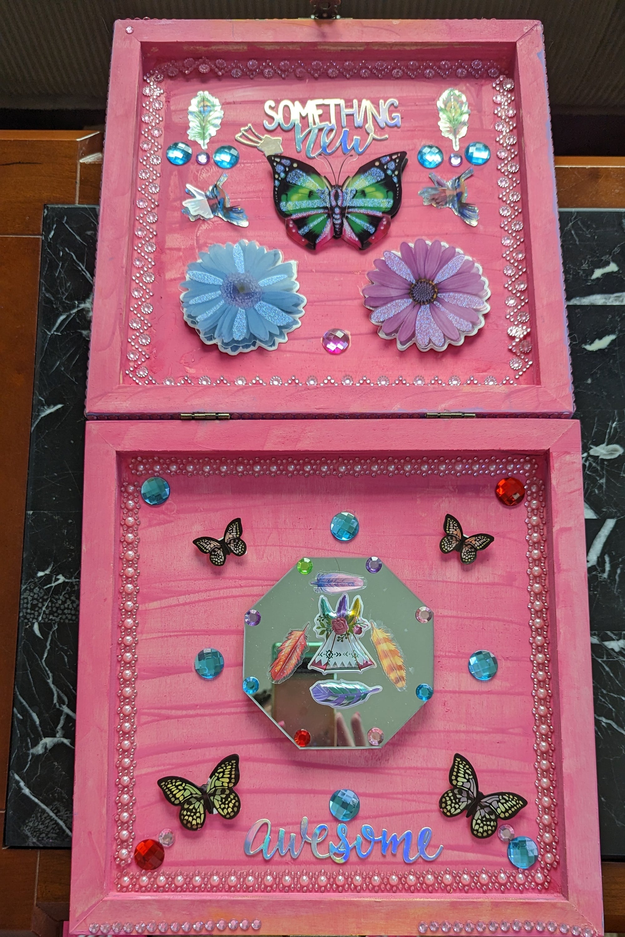 A beautifully hand-decorated Wish Box by Sharon Tatem featuring intricate designs and a powerful maiden, symbolizing dreams and aspirations.