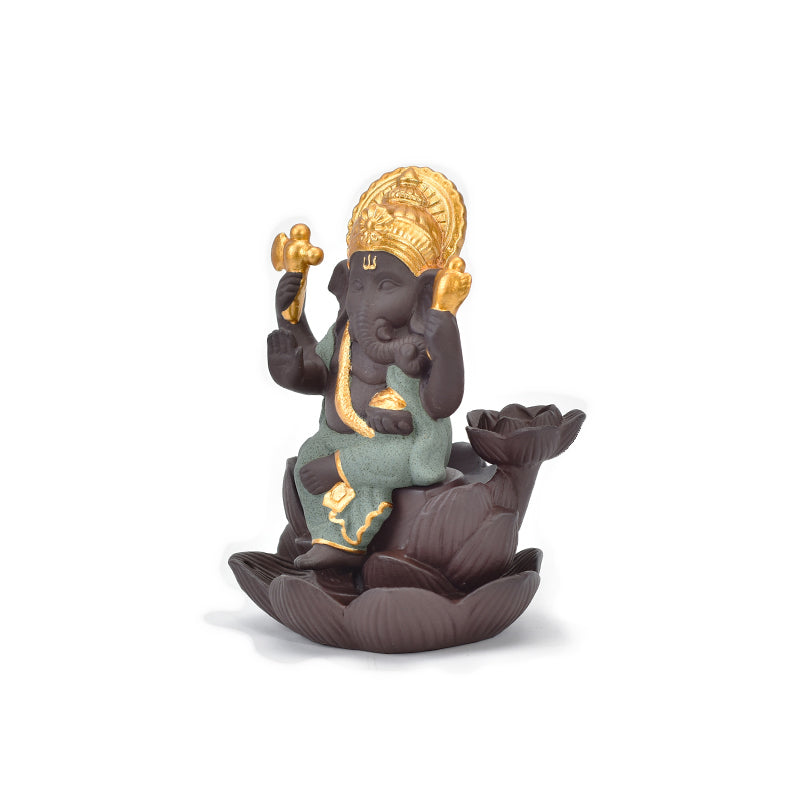 Brûleur d'encens en céramique 'Ganesh Vert' avec une statue de Ganesh, symbole de chance et de prospérité.