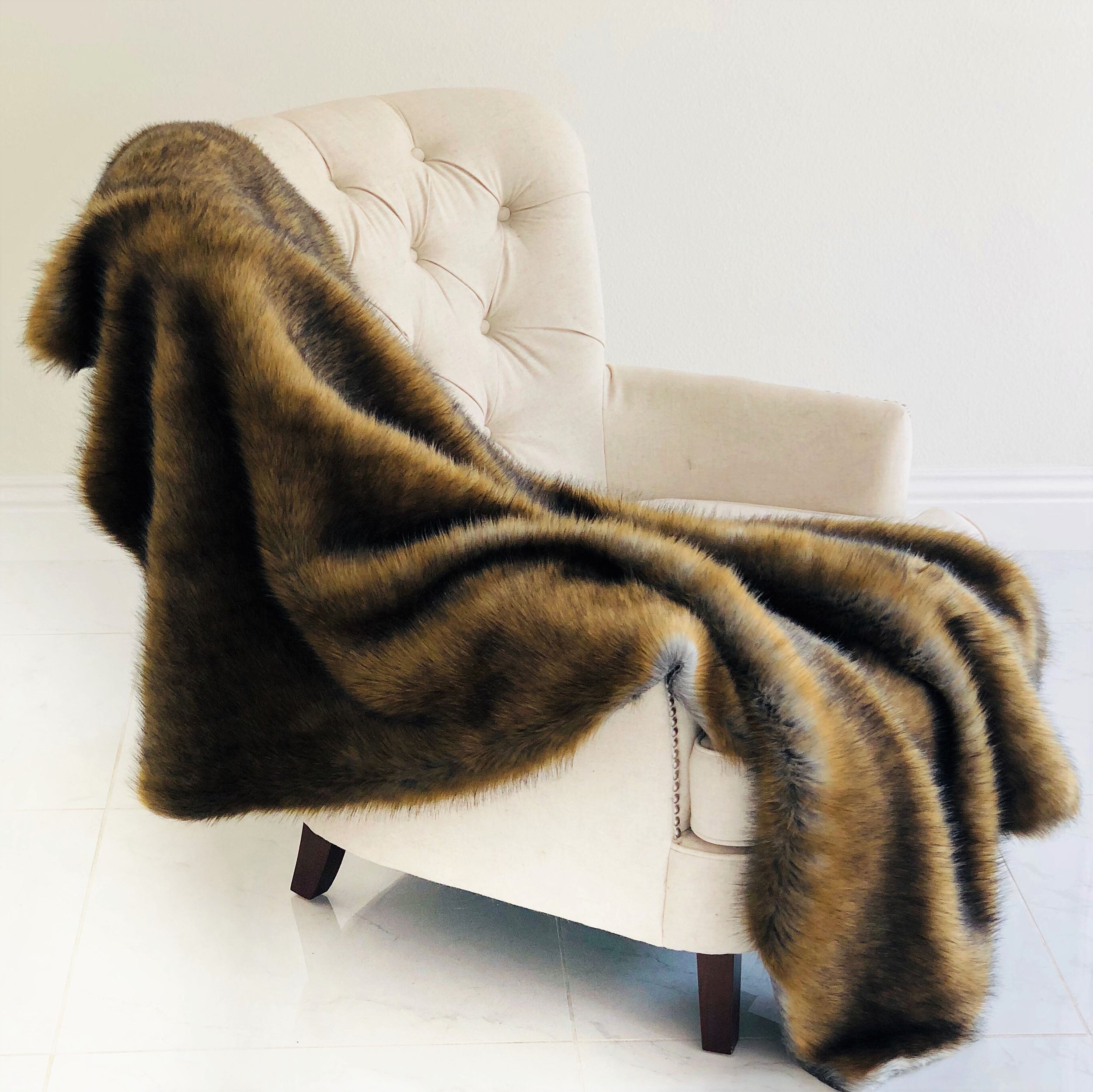 Luxurious Brown and Grey Wild Grizzly Bear Faux Fur Throw, showcasing its plush texture and reversible design.