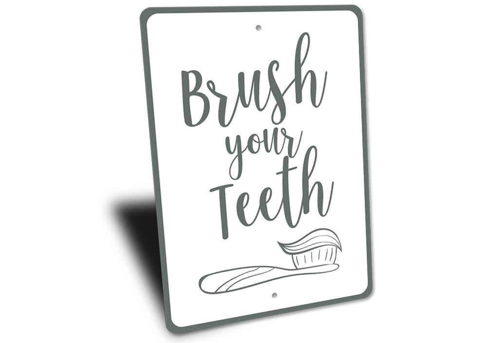 A decorative Brush Your Teeth Sign made of high-quality aluminum, featuring a vibrant design suitable for home decor.