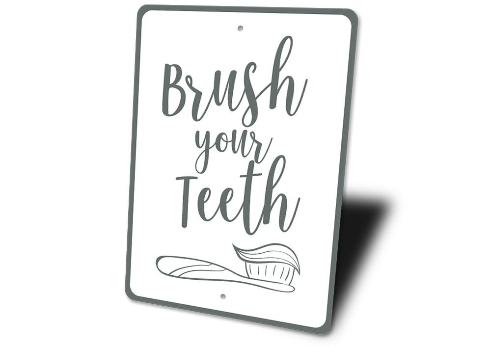 A decorative Brush Your Teeth Sign made of high-quality aluminum, featuring a vibrant design suitable for home decor.