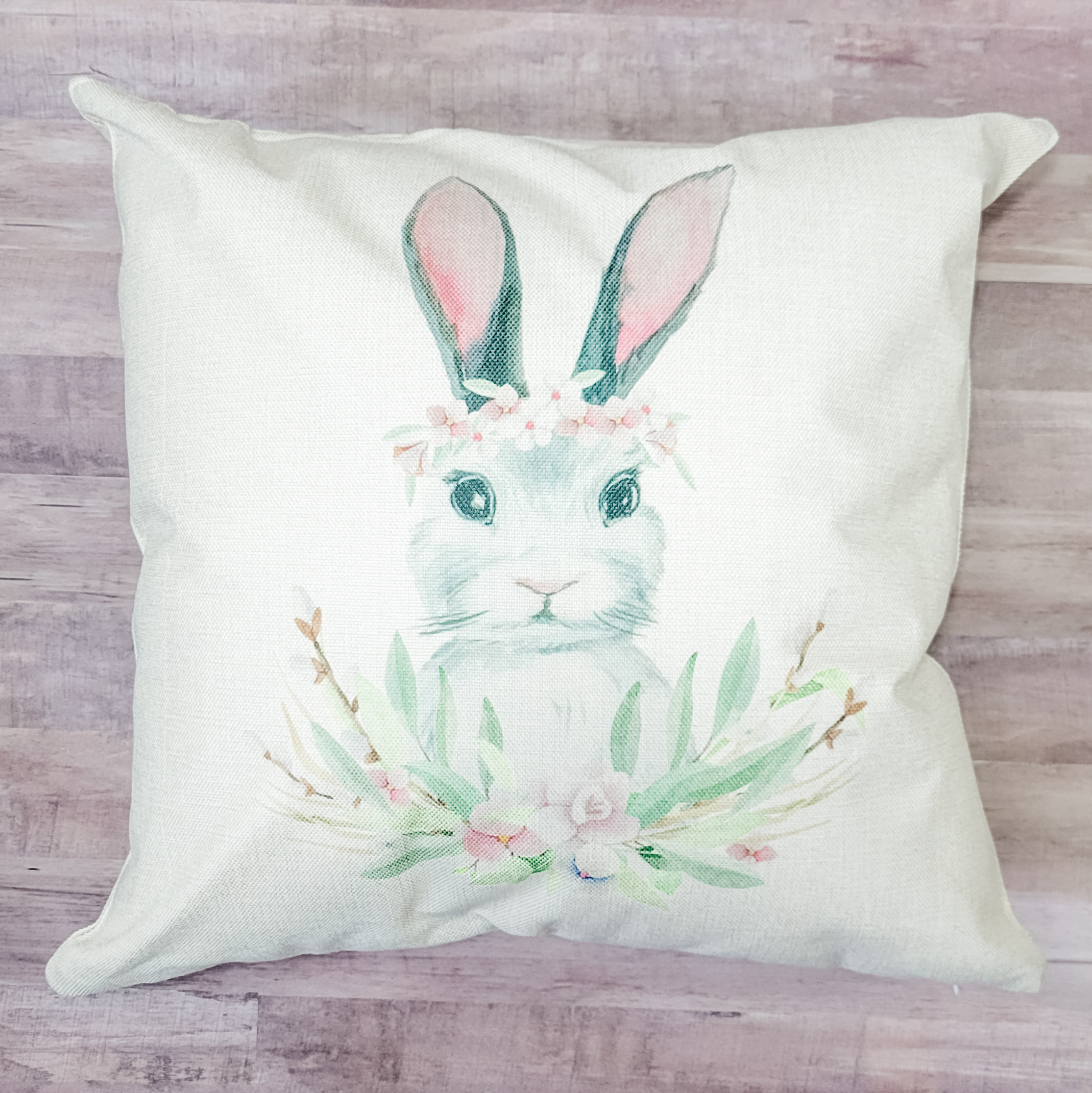 Bunny Crown Pillow Cover featuring floral designs on a soft linen fabric, perfect for Spring and Easter decor.