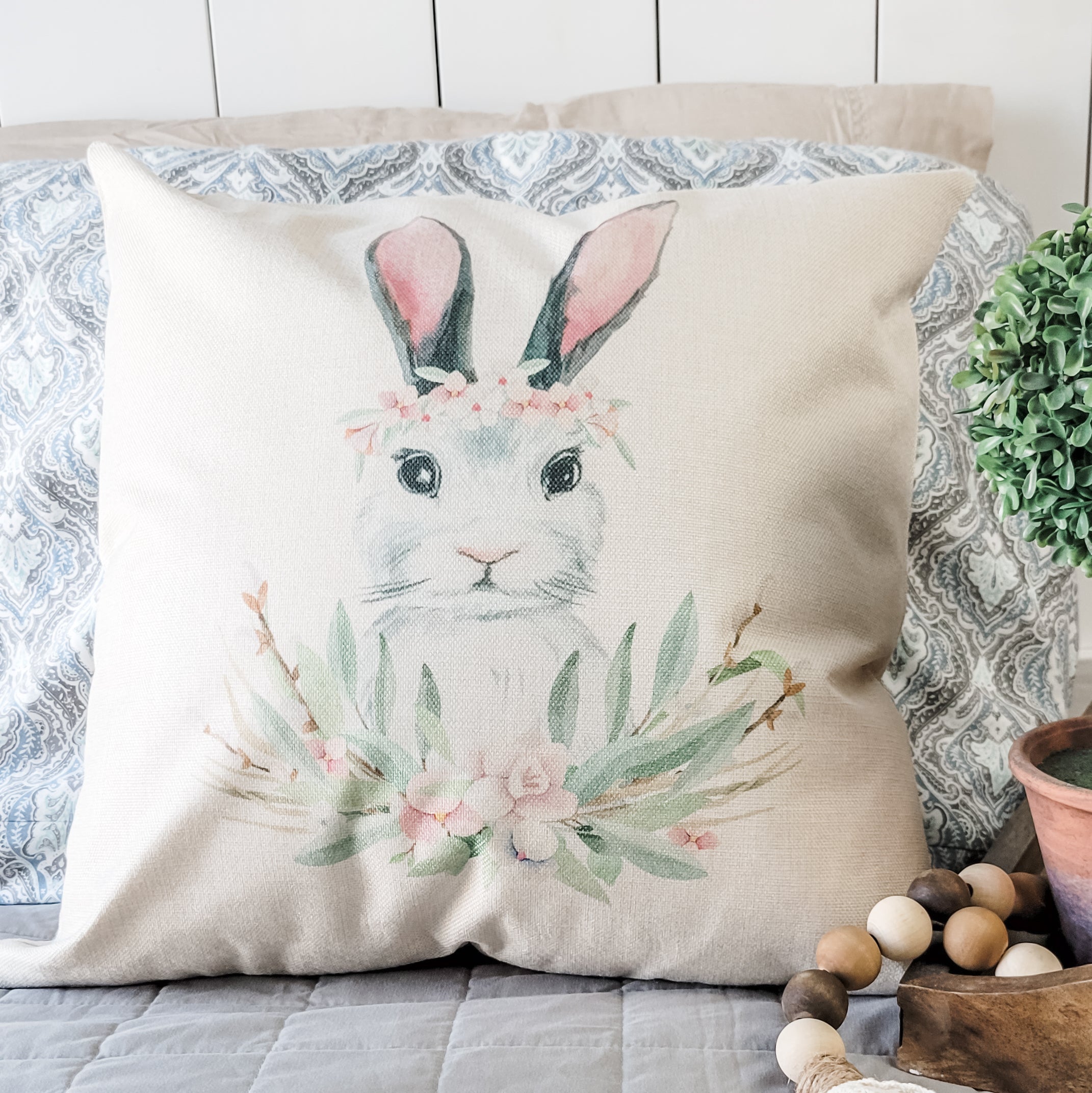 Bunny Crown Pillow Cover featuring floral designs on a soft linen fabric, perfect for Spring and Easter decor.