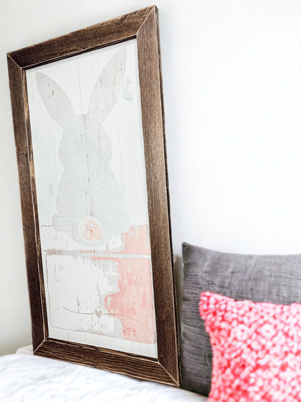 Rustic Bunny Tail sign framed in black, featuring a vintage design perfect for spring decor.