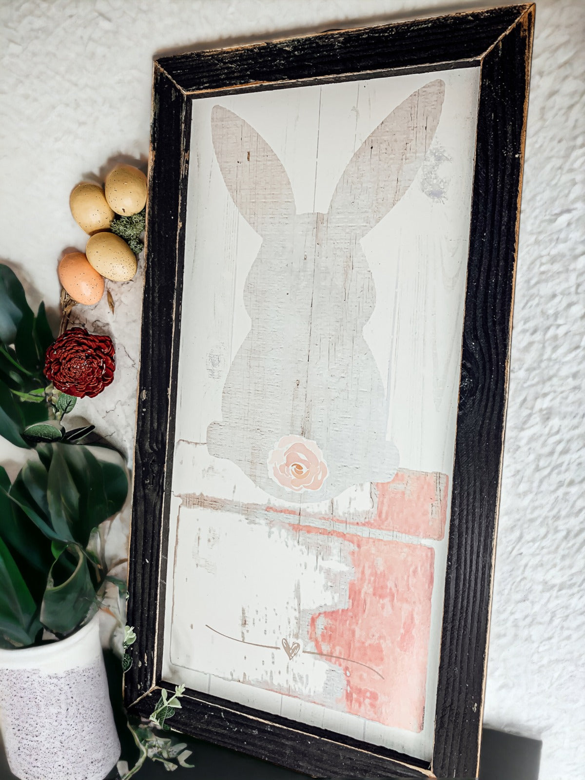 Rustic Bunny Tail sign framed in black, featuring a vintage design perfect for spring decor.