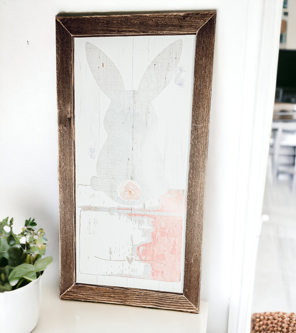 Rustic Bunny Tail sign framed in black, featuring a vintage design perfect for spring decor.