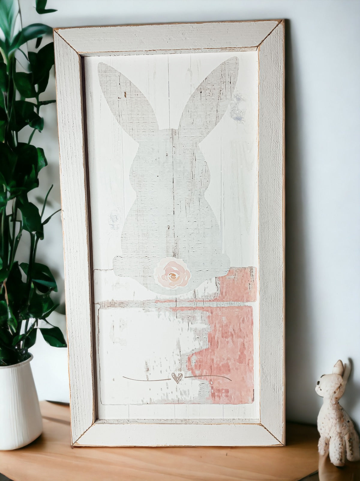 Rustic Bunny Tail sign framed in black, featuring a vintage design perfect for spring decor.