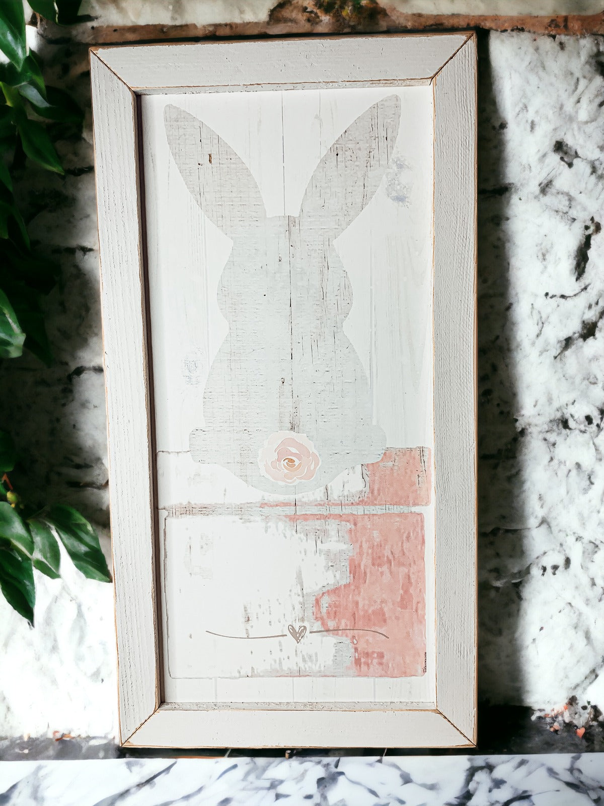 Rustic Bunny Tail sign framed in black, featuring a vintage design perfect for spring decor.