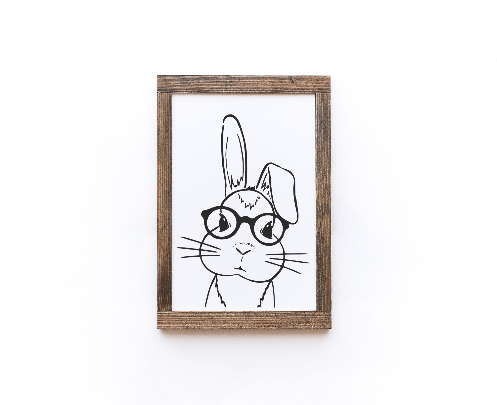 Handcrafted Bunny Wood Sign in matte white finish, showcasing unique wood grain and knots.