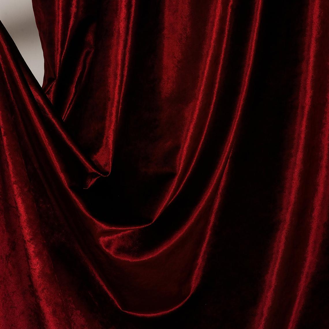 Burgundy Luxury Velvet Curtain hanging elegantly in a stylish room, showcasing its rich color and soft texture.